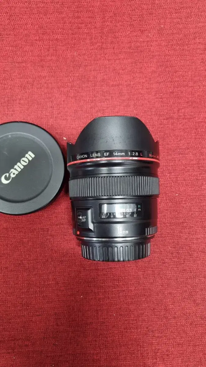 I sell a Canon 14mm 2.8 old model.