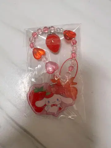 산리오 딸기 신문 50주년 디자인 시크릿 스트랩 시나모롤