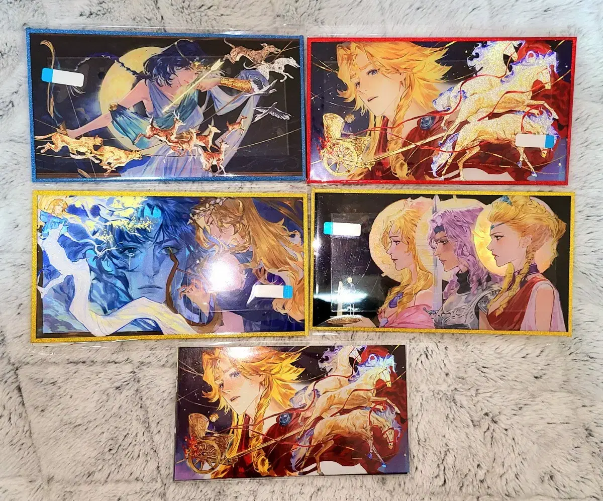 Selling Olympus Guardian goods including colored paper and postcards in bulk