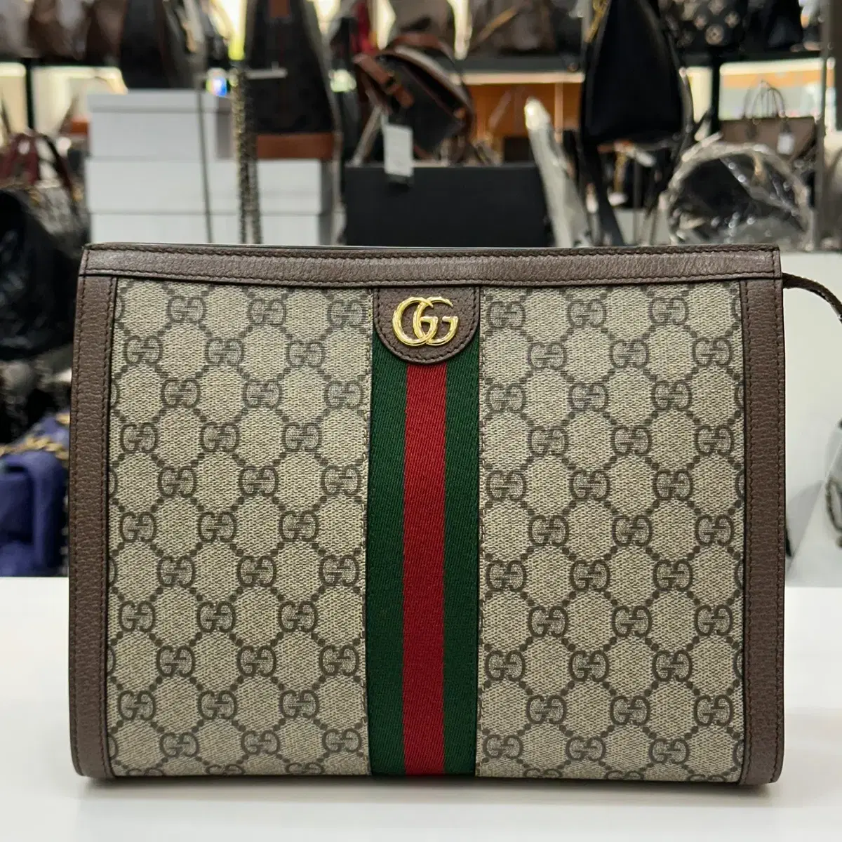구찌 오피디아 GG 수프림 캔버스 클러치 625549