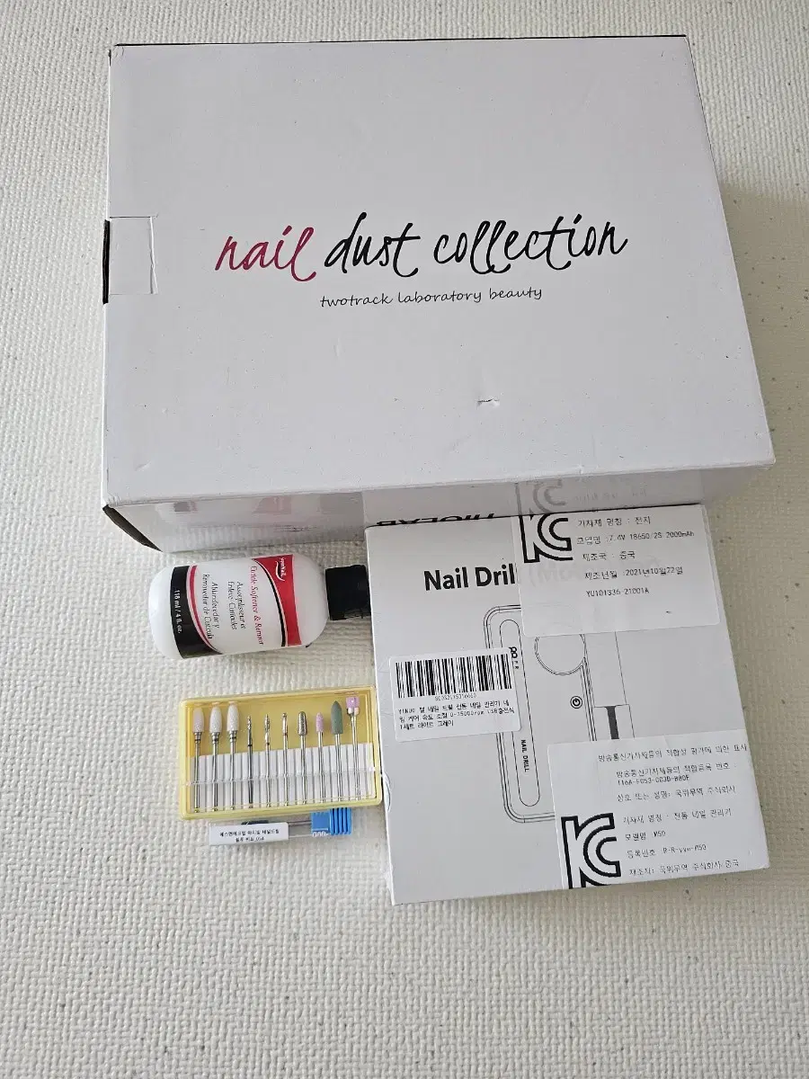 Nail drill, dust collector, and bit set