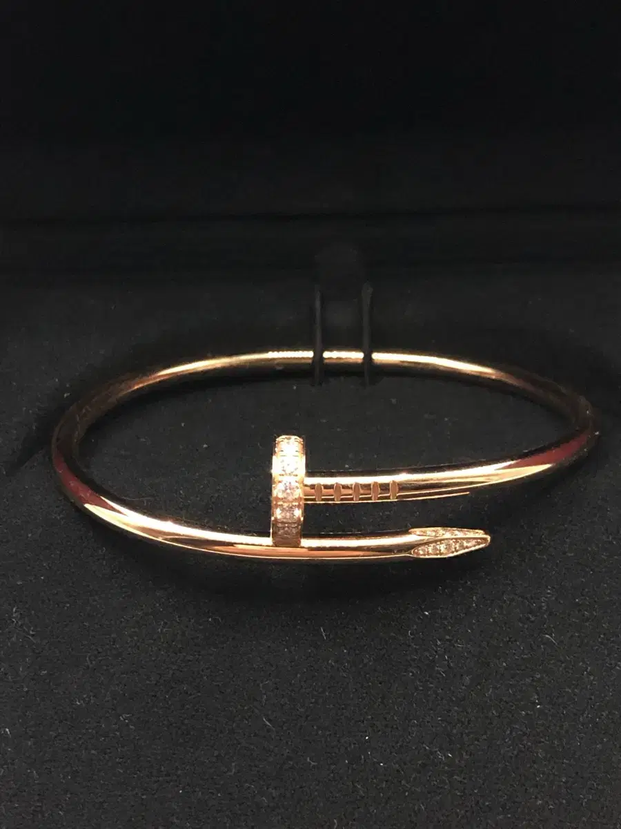 Selling a 24' Cartier Ecrou bracelet, half-dia, rose gold, size 16.
