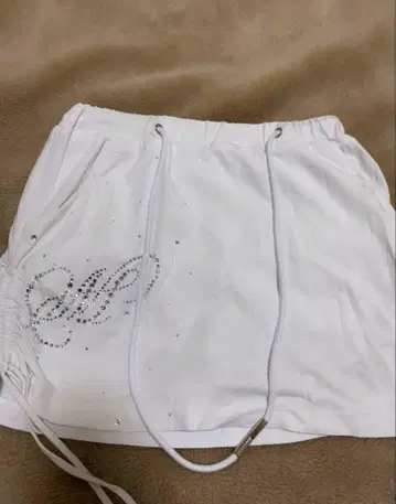 MELTTHELADY 멜트 더 레이디 로고 그라데이션 스커트