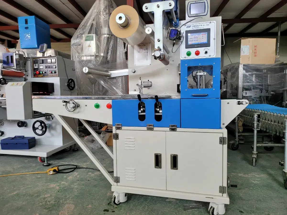 Used Korean Horizontal Three-sided Packaging Machine, Full Servo Type, Box Motion, Top Feed