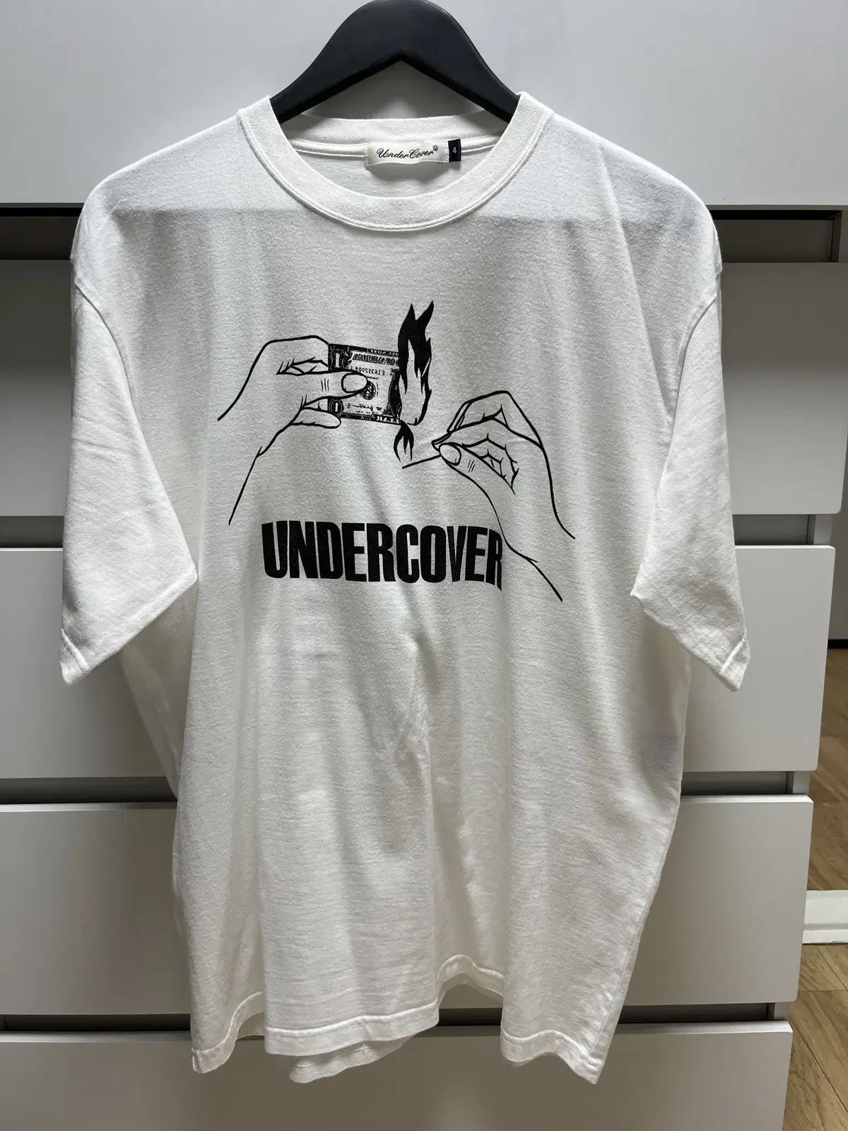 Selling Undercover short sleeve t-shirt, size 4.