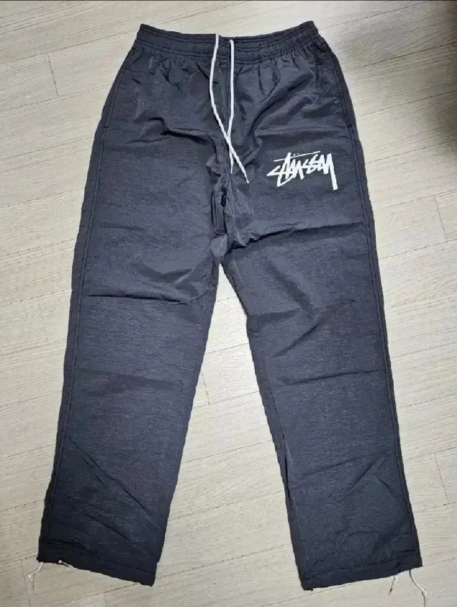 [ S ] 나이키 x 스투시 비치 팬츠 오프 느와르