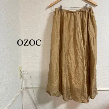 OZOC 오조크 플레어 스커트 허리 밴딩 브라운 광택 40