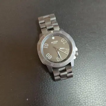 nixon 100 meter 남성용 손목시계