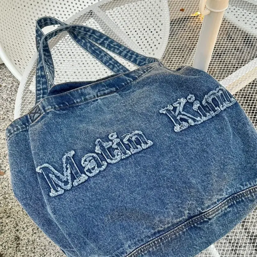 MATIN KIM | 마뗑킴 Matin Kim Logo Washed Denim Tote Bag in