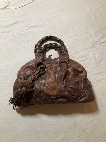 브라운 가죽 보스턴 백 프린지 장식