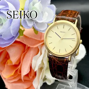 작동 손목시계 SEIKO 세이코 골드 새상품 배터리 라운드 D56