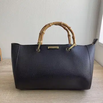 KATIE LOXTON 브라운 핸드백