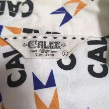 전체 로고 프린트 CALEE 면 셔츠