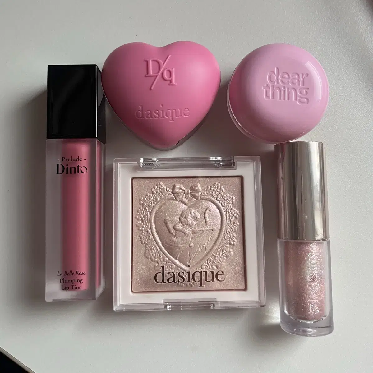 Cool tone cosmetics bulk: Dasique, Dinto, Rom&nd highlighter, shadow, lip & cheek tint