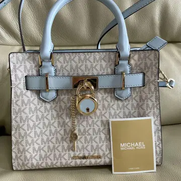 MICHAEL KORS 바디 크로스 백 베이지/라이트 블루