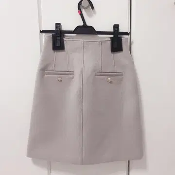 JUSGLITTY 저스길리티 전개 버튼 디테일 스커트
