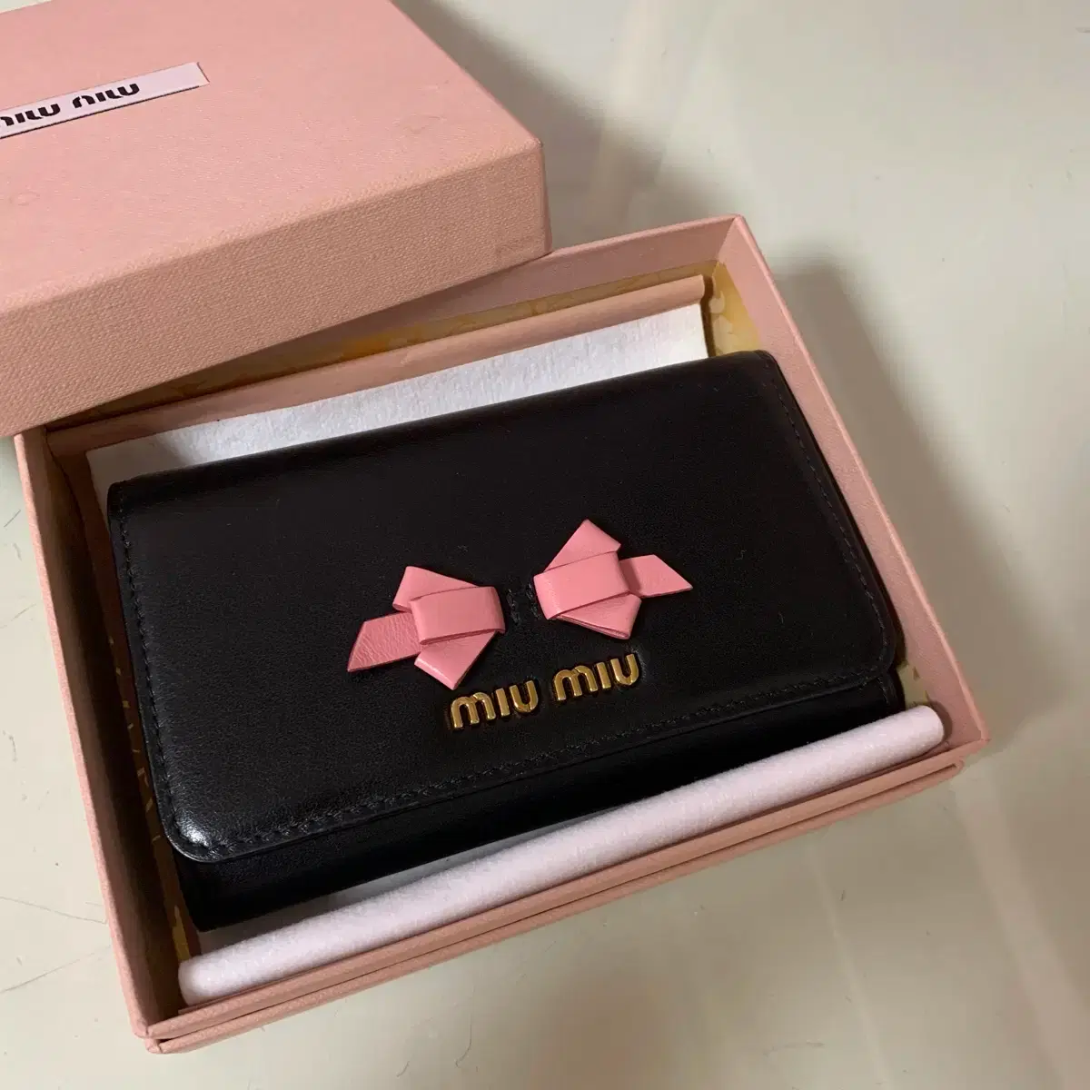 年末ラストセール☆30%OFF】ミュウミュウ 長財布 ファスナー付き長財布 