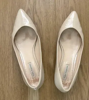 파비오 루스콘이 아이보리 펌프스