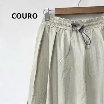 COURO 파이핑 사이드 라인 나일론 스커트