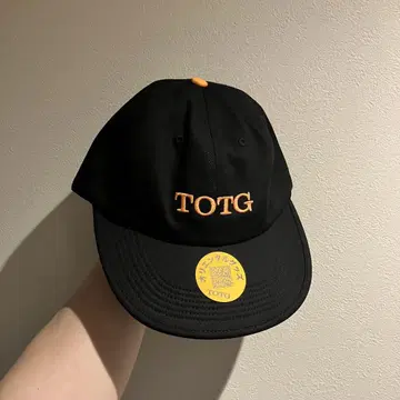 TOTG 투어 기념 모자 블랙/오렌지