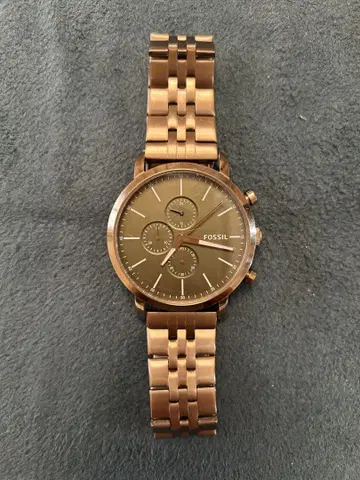 FOSSIL 스테인리스 소재 손목시계 세련된 골드 파슬