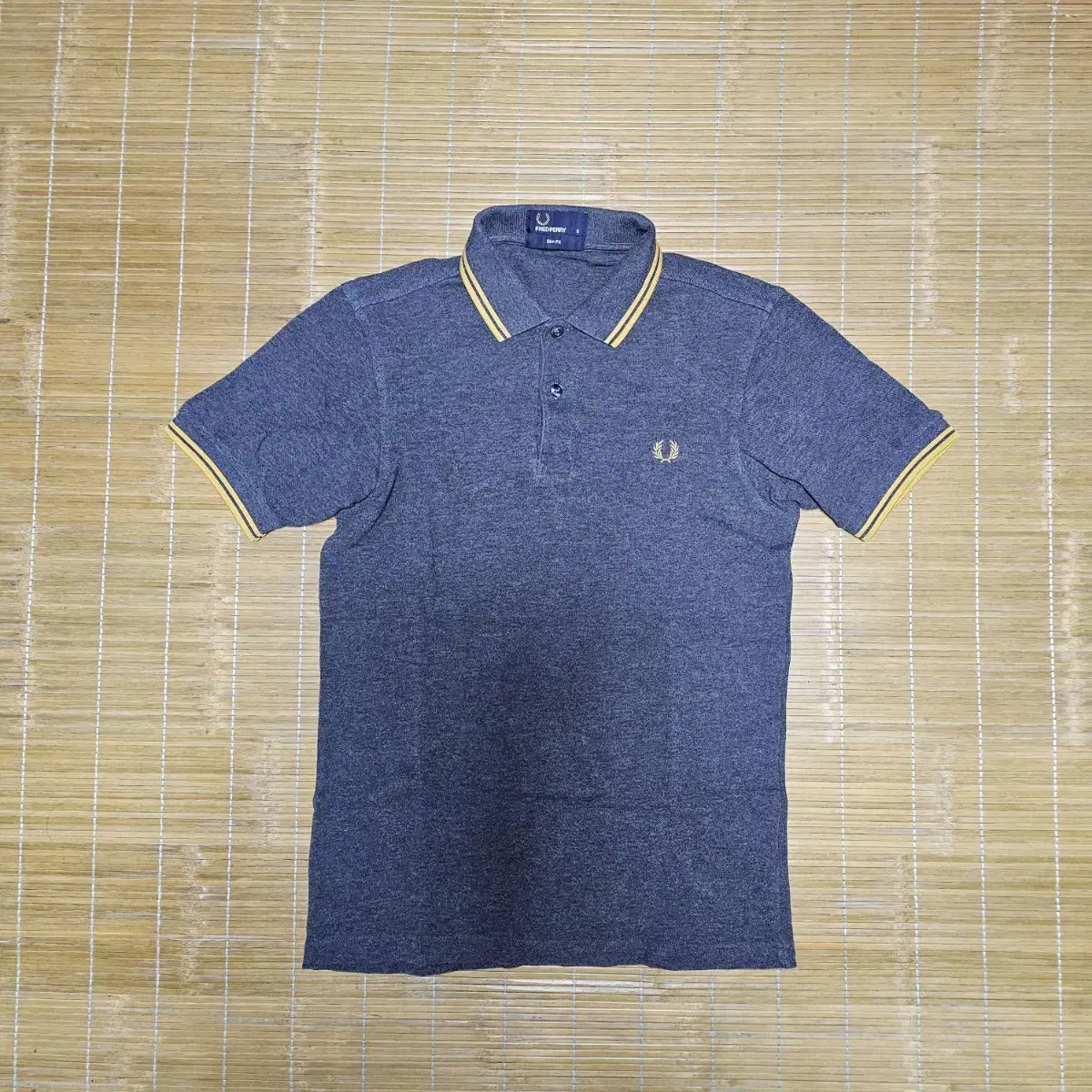 Fred Perry polo shirt (Men's 90, Women's 55)