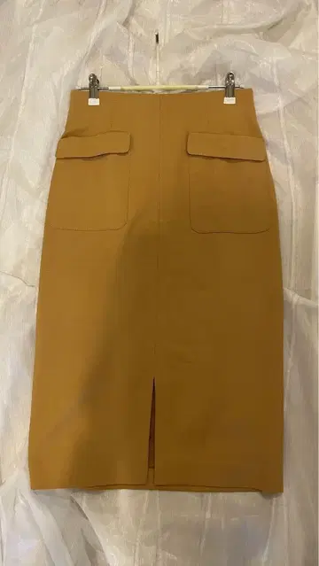 노리즈 머스타드 타이트 스커트 포켓 부착