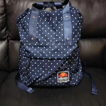 ellesse 도트 무늬 네이비 캔버스 백팩