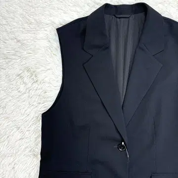지유 새상품 택 포함 블랙 오버 사이즈 테일러드 베스트