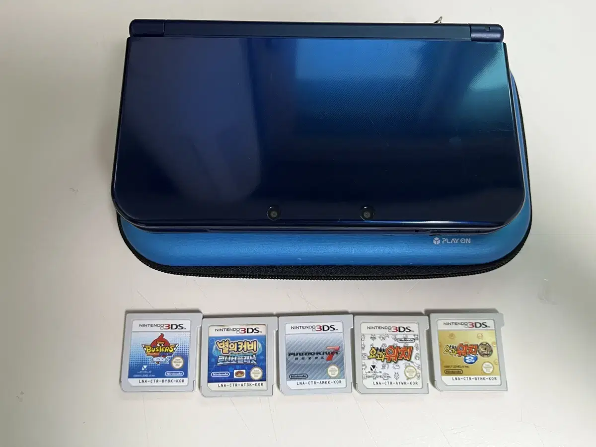 New Nintendo 3DS XL + 5 Games and Charger Included
