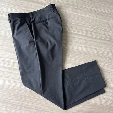 유니버설 랭귀지 플리츠 카노니코 울 슬랙스 다크 그레이