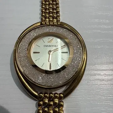SWAROVSKI 스와로브스키 손목시계 크리스탈 라인 오벌 골드