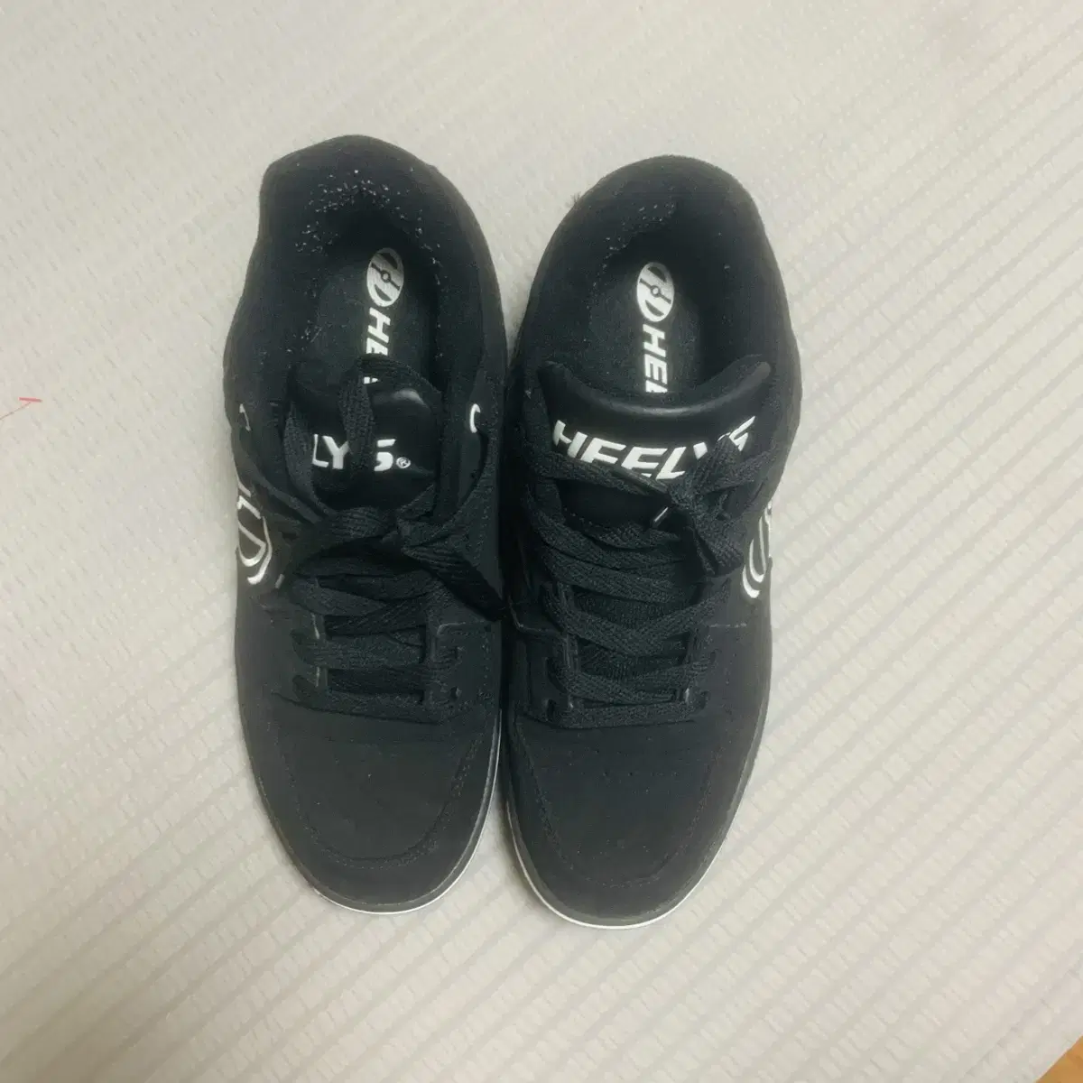 Black Heelys roller shoes