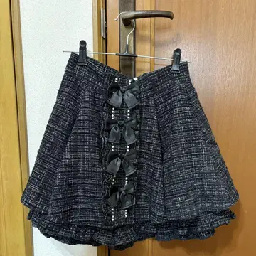 앙크루즈 반짝이는 트위드 리본 치마바지