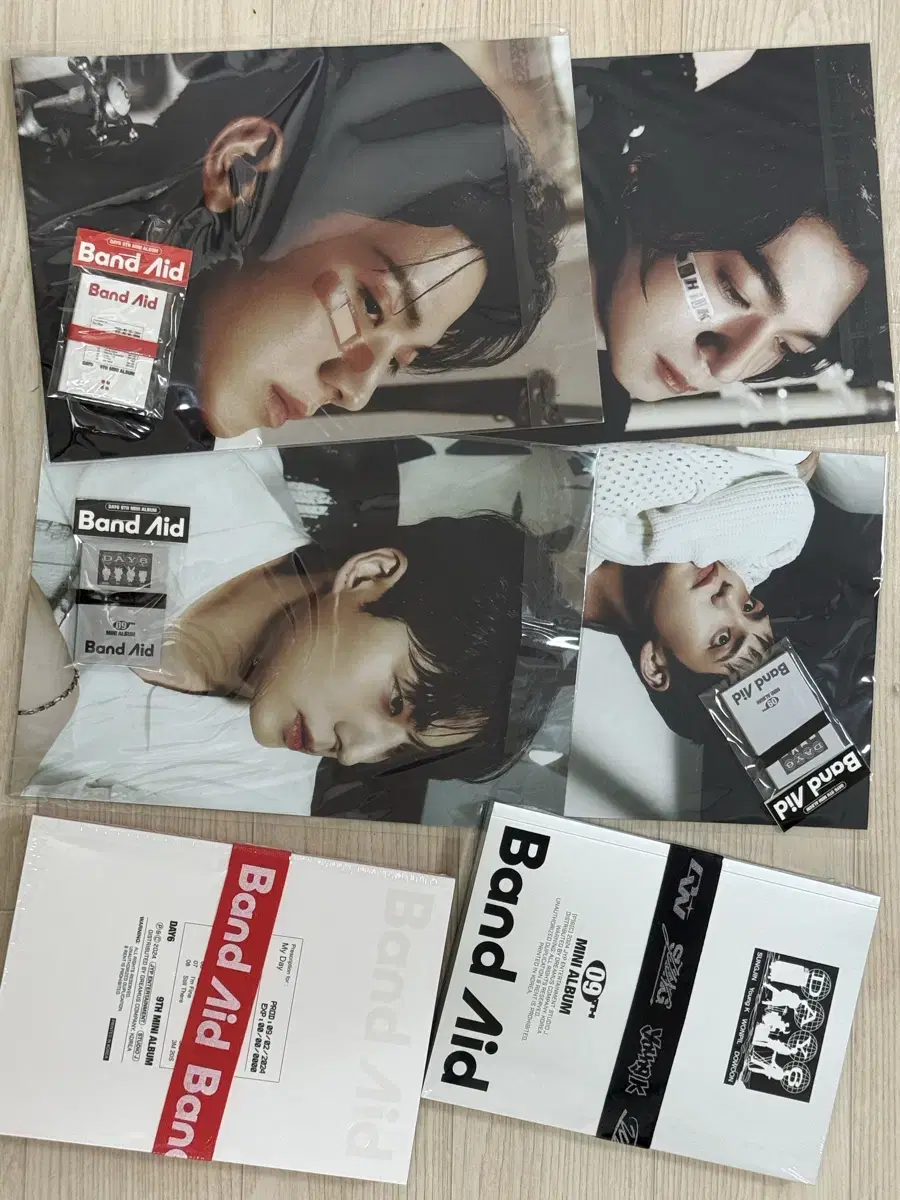 DAY6 Band Aid sealed album (1) + preorder benefit poster (1) + mini photobook