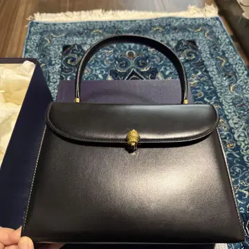 WAKO 블랙 가죽 핸드백