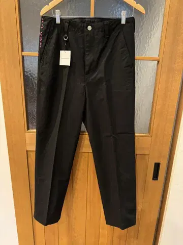 일관된 실험 CHINO 테이퍼드 팬츠