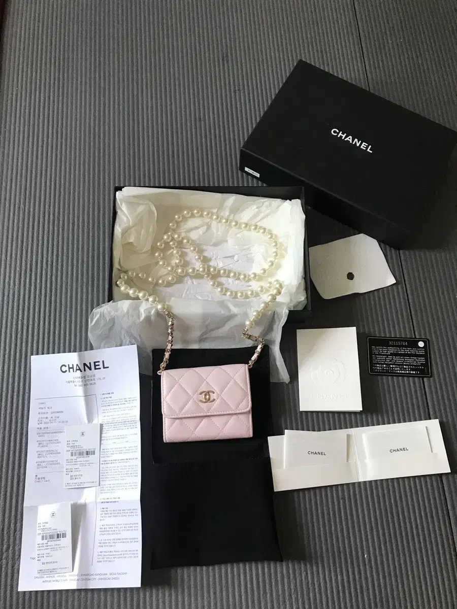 Authentic Chanel Pearl Chain Mini Cross Bag
