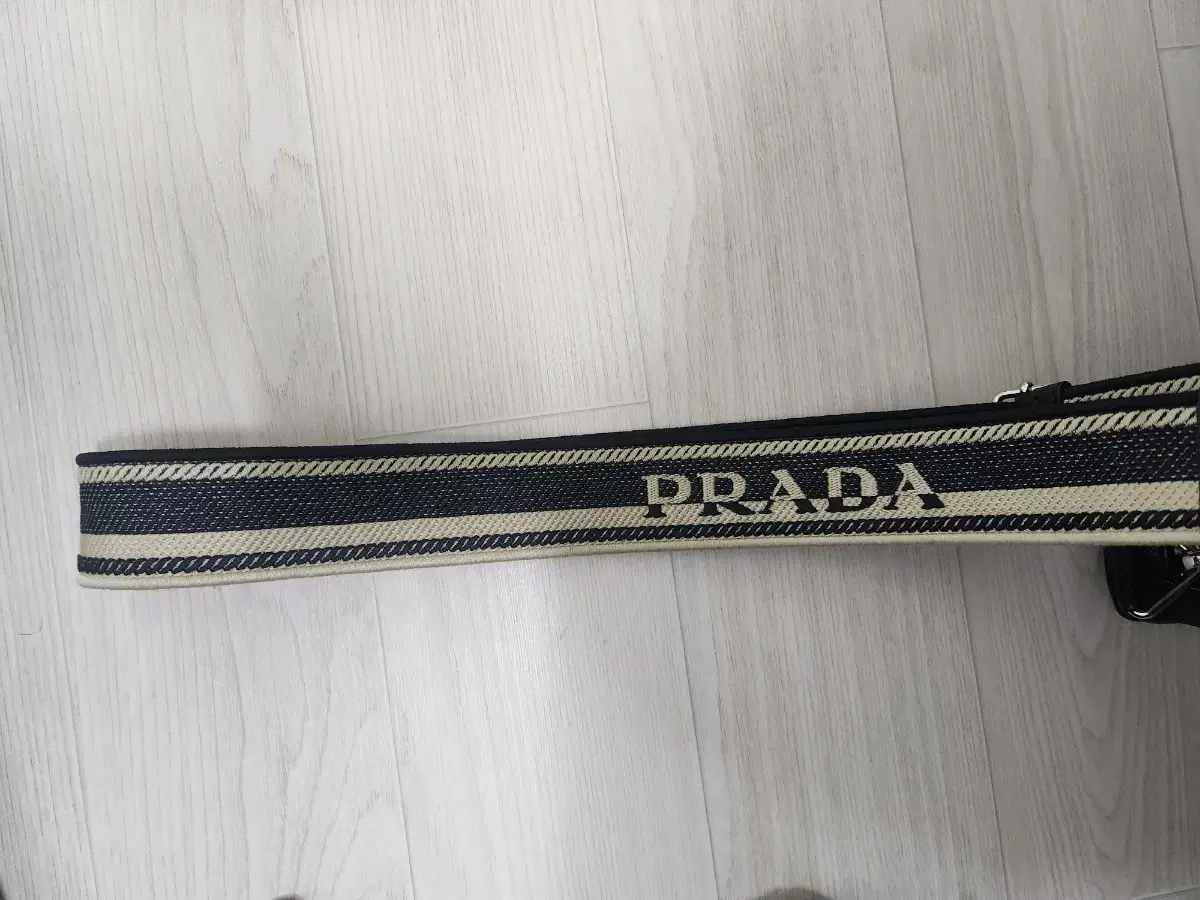 Prada Saffiano Triangle Crossbody Bag