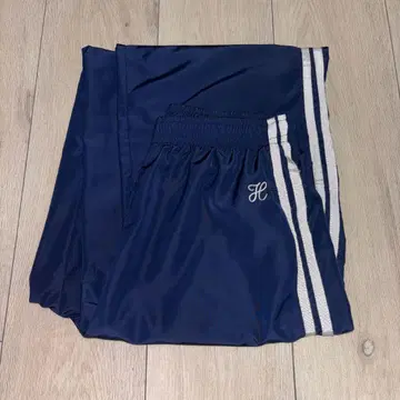 헤더 사이드 라인 트랙 팬츠