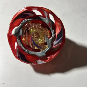 빨간색 스핀 메커니즘이 있는 팽이