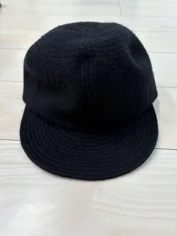 Nine tailor 캡
