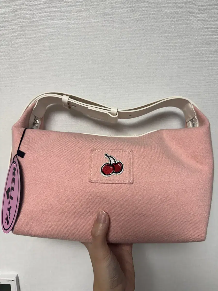 Kelly's Kirsh Peach Cushion Bag