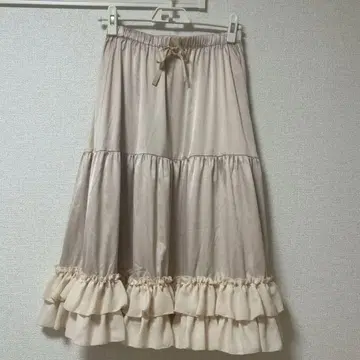 엑시즈팜 카와이 미디 프릴 페치 스커트 베이지