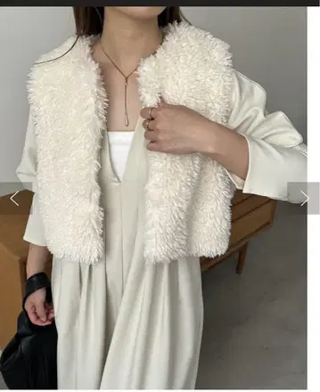 컬리 퍼 베스트