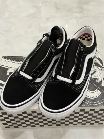 Vans 슬립온 블랙/화이트