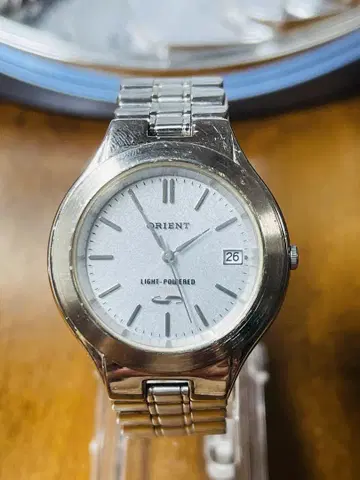 ORIENT LIGHT-POWERED 실버 시계