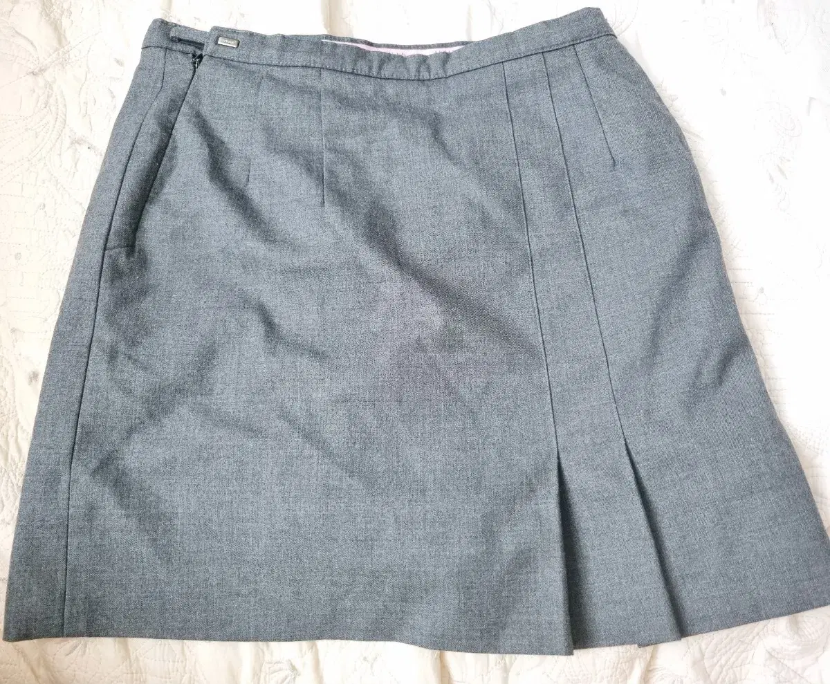Two school uniform skirts