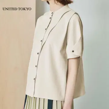 UNITED TOKYO 폴드 볼륨 소매 블라우스
