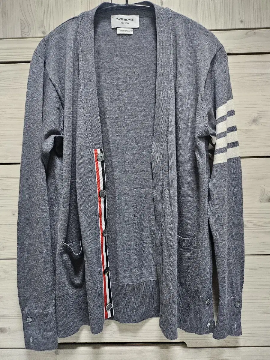 [3] Thom Browne. Merino Wool Cardigan
